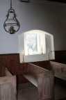 pews and oil lamp