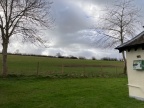 field boundary to north